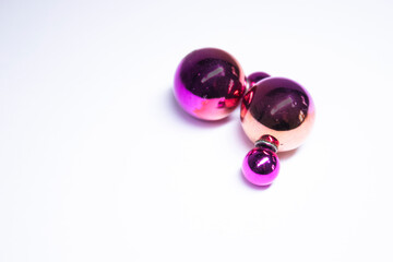 Pink round earrings. jewelry and accessories concept. Isolated, copy space. Macro Shot. High quality photo