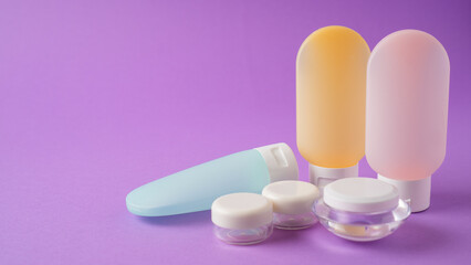 essential travel kit. toiletry kit. cosmetic bottles. small cosmetic travel containers for cream, shampoo, conditioner