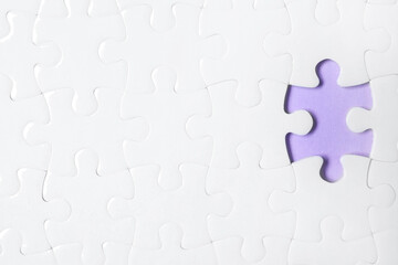 Fototapeta premium Blank white puzzle with missing piece on violet background, top view. Space for text