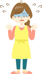 Panicked young woman in yellow apron