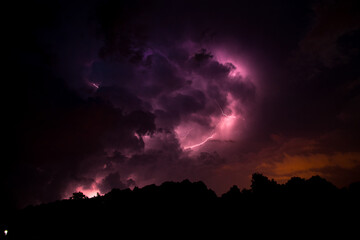 Storm clouds and lightning in Marcinkowice, Malopolskie, Poland. © Pawe