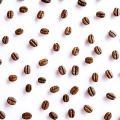 Pattern of coffee beans on white background