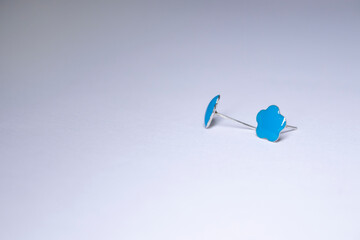 blue earrings, star-shaped. jewelry and accessories concept. Isolated, copy space. Macro Shot. High quality photo
