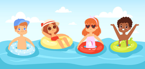 Multinational children have fun and jumping in the water. Boys and girls with inflatable rubber circles swimming in the sea. Happy kids having fun in the summer time. Landscape, panorama sea view