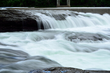 beautiful massive river flow and waterfalls in summer nature