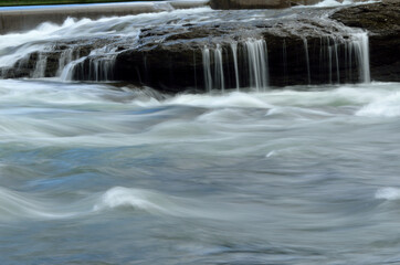 beautiful massive river flow and waterfalls in summer nature