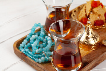 Turkish tea with oriental desserts on table