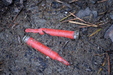 red blank training ammunition on ground