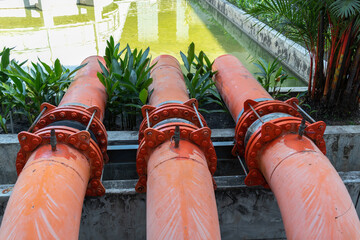 Three steel pipes for drain waste water in environment system.