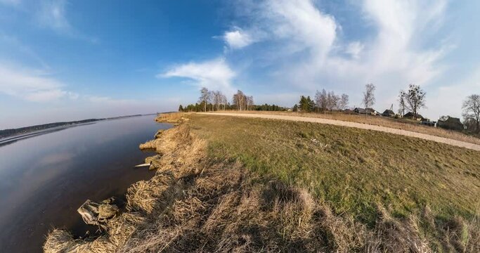 NO VR. Little planet Transformation with curvature of space. full flyby panorama near big lake and beautiful clouds in the sky
