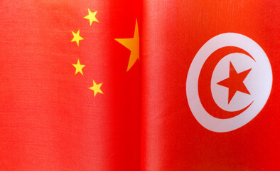 fragments of the national flags of China and Tunisia close up