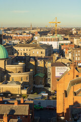 View From the Rooftops of a European City at Dusk. Industrial Landscape and Travel.