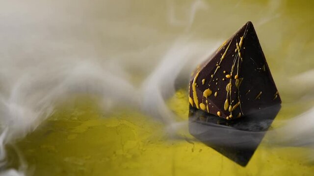 Smoke envelops the chocolate.