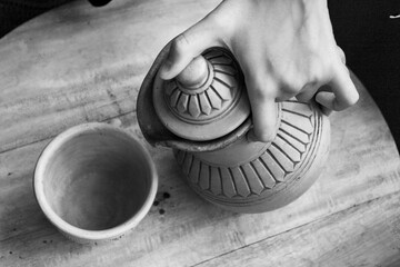 Mud made jug and glass 