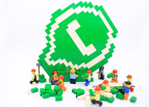 HONG KONG; JULY 25: lego minifigure with the set of city lego in hong kong on 25 july 2017. Legos are a popular line but of plastic construction toys manufactured by The Lego Group in Denmark