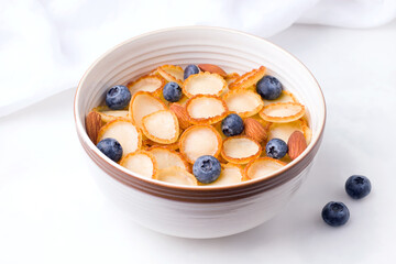 Tiny pancake cereal breakfast with berries