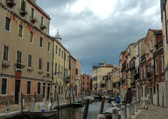 Fototapeta na wymiar Empty street and canal in Venice Italy