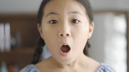Asian little girl scared expression