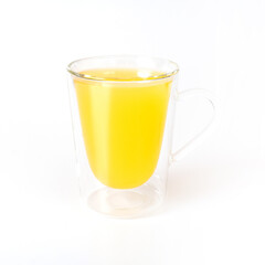 Glass mug with natural orange juice isolated on a white background