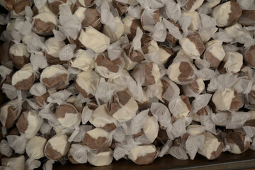 Brown and White Candy in a Grocery Store