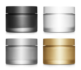 Collection of cosmetic cream jars (black, white, silver and gold), isolated on white background