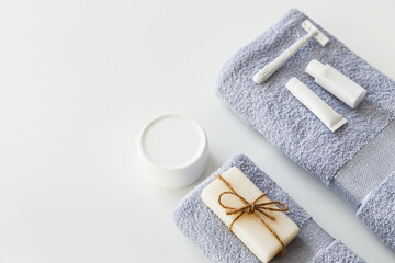 Body and skin hygienic care toiletry spa accessories, on white background. Flat lay. Copy space