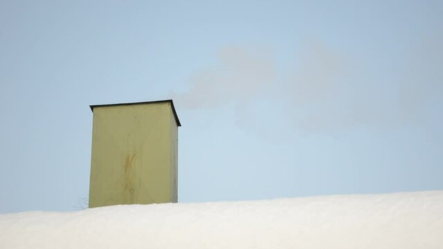 wood burning smoke from chimey