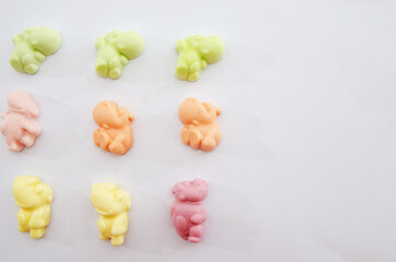 colored chewing sweets on a white background. Copy of space. Place for text.