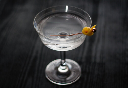 Vesper martini cocktail with a lemon peel garnish.