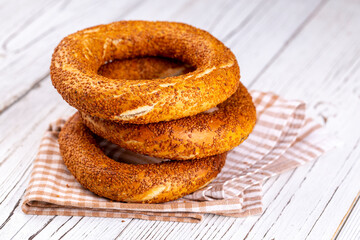 Turkish fast food bagel called Simit. Turkish bagel Simit with sesame. Bagel is traditional Turkish bakery food.