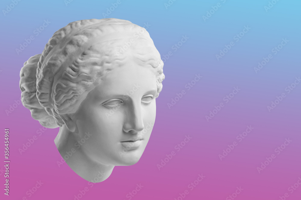 Wall mural Statue of Venus de Milo. Creative concept colorful neon image with ancient greek sculpture Venus or Aphrodite head. Webpunk, vaporwave and surreal art style.