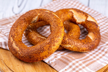 Turkish fast food bagel called Simit. Turkish bagel Simit with sesame. Bagel is traditional Turkish bakery food.