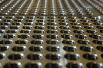 Fototapeta premium holes in thick metal for heat exchanger
