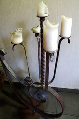 floor lamp with melted candles