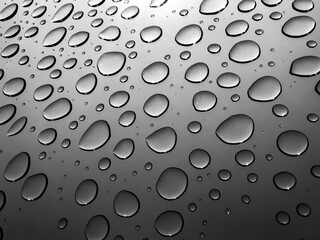 Water drops through the window after the rain.