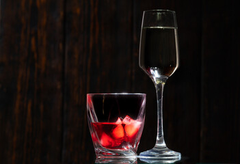 Glasses of brandy and white wine on a counter