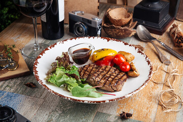 Appetizing beef steak with grilled vegetables