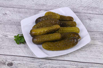Pickled cucumbers heap in the bowl