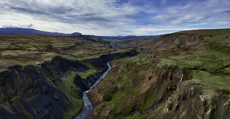 Haifoss waterfall in the highlands of Iceland, Aerial view. Dramatic landscape of Waterfall in Landmannalaugar canyon