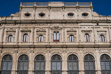 Fototapeta na wymiar Seville City Hall building in Plaza of San Francisco on a summer day. Vertical photograph