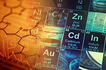 Laboratory glassware and periodic table of elements. Science concept.