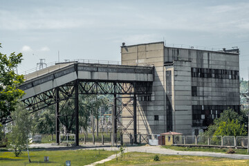Fototapeta na wymiar Obsolete building for coal transportation.
