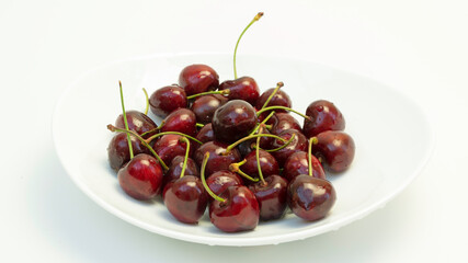 red cherries on white background