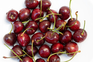 red cherries on white background