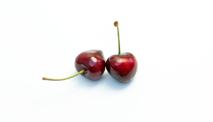 red cherries on white background