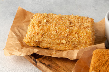 Piece of honey cake on kitchen table