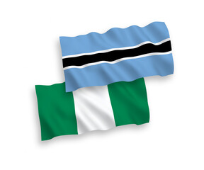 Flags of Botswana and Nigeria on a white background