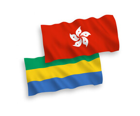 Flags of Gabon and Hong Kong on a white background