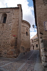 Toledo town street view with historical buildings in Spain.