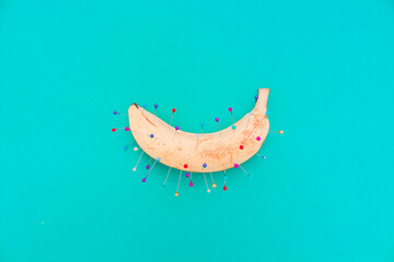 colorful banana with pins 